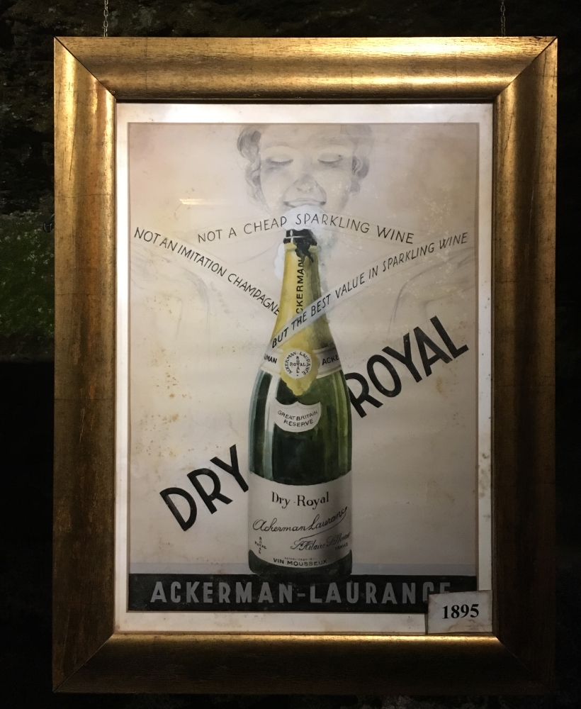 Une des vieilles affiches visant à faire la promotion du vin. Photo: Marie-Julie Gagnon